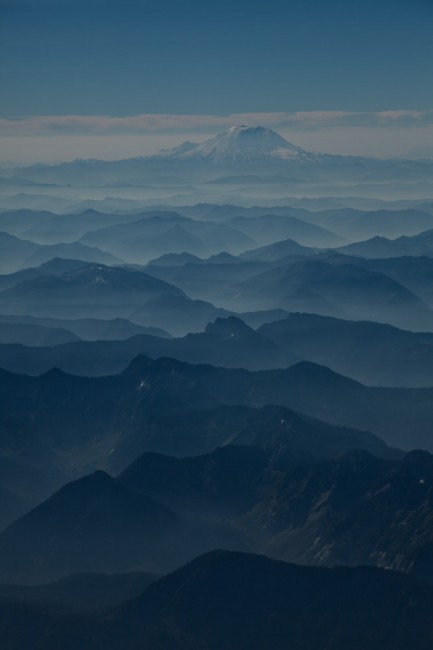 Flying into a sunny Seattle, the lifting fog shows Mt. Rainier.